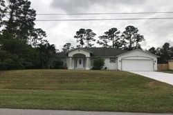 Pre-foreclosure in  SW JANETTE AVE Port Saint Lucie, FL 34953