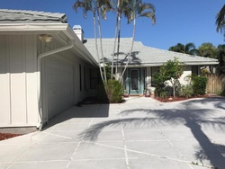 Pre-foreclosure in  N NORMANDY WAY Palm Beach Gardens, FL 33410
