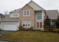 Pre-foreclosure in  SUMMERFIELD DR Holtsville, NY 11742