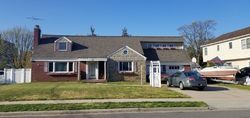 Pre-foreclosure in  NASSAU PKWY Oceanside, NY 11572