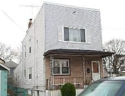 Pre-foreclosure Listing in LINCOLN AVE MINEOLA, NY 11501