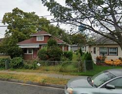 Pre-foreclosure in  E COLUMBIA ST Hempstead, NY 11550