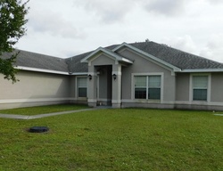 Pre-foreclosure in  SW DUVAL AVE Port Saint Lucie, FL 34983