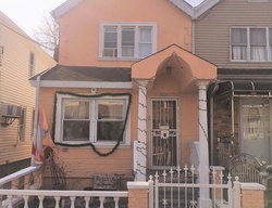 Pre-foreclosure Listing in 84TH ST WOODHAVEN, NY 11421