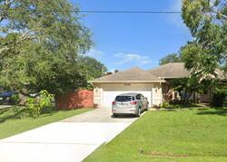 Pre-foreclosure in  SW IMPORT DR Port Saint Lucie, FL 34953