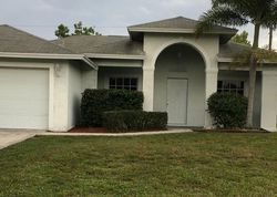 Pre-foreclosure in  SW DARIEN ST Port Saint Lucie, FL 34953