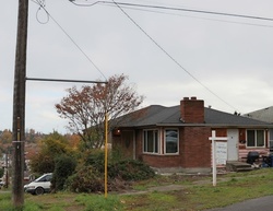 Pre-foreclosure in  18TH AVE S Seattle, WA 98144
