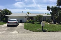 Pre-foreclosure in  RAINWOOD CIR W Palm Beach Gardens, FL 33410