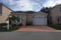 Pre-foreclosure in  SEMINOLE TER Pompano Beach, FL 33063