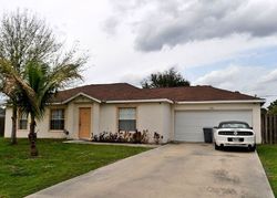 Pre-foreclosure in  SW CENTURY AVE Port Saint Lucie, FL 34953