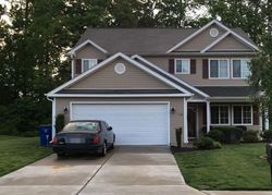 Pre-foreclosure in  WALNUT CROSSING DR Whitsett, NC 27377