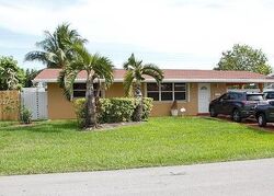 Pre-foreclosure in  NW 1ST ST Hollywood, FL 33024