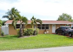 Pre-foreclosure in  NW 1ST ST Hollywood, FL 33024