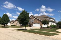 Pre-foreclosure in  AMHERST CIR Oswego, IL 60543