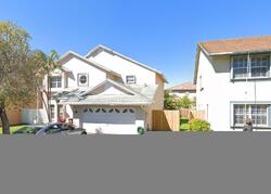 Pre-foreclosure in  NW 192ND ST Hialeah, FL 33015