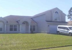 Pre-foreclosure in  SW CARTER AVE Port Saint Lucie, FL 34983