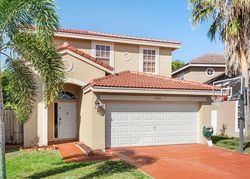 Pre-foreclosure in  LAKEWOOD COVE CT Lake Worth, FL 33467