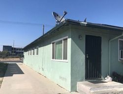 Pre-foreclosure in  E 55TH ST Los Angeles, CA 90011
