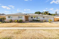 Pre-foreclosure in  E LOS ALTOS AVE Fresno, CA 93710