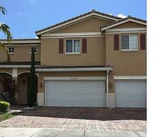 Pre-foreclosure in  NW 11TH AVE Miami, FL 33169