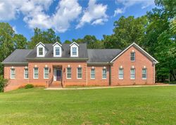 Pre-foreclosure in  OAK VALLEY LN Browns Summit, NC 27214