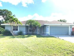 Pre-foreclosure in  NW RAVENSWOOD LN Port Saint Lucie, FL 34983