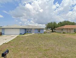 Pre-foreclosure in  NE 10TH TER Cape Coral, FL 33909