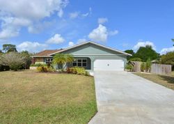 Pre-foreclosure in  SW WOODCREEK DR Palm City, FL 34990