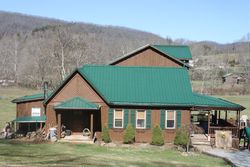 Pre-foreclosure in  BEECHER HOLTSCLAW RD Roan Mountain, TN 37687