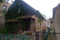 Pre-foreclosure in  S LITUANICA AVE Chicago, IL 60608