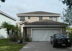 Pre-foreclosure in  CRESCENT CREEK CT Pompano Beach, FL 33073