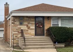Pre-foreclosure in  S MARQUETTE AVE Chicago, IL 60633