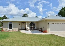 Pre-foreclosure in  SW HINCHMAN ST Port Saint Lucie, FL 34984