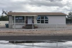 Pre-foreclosure in  W DOS ROTUNDO Tucson, AZ 85743