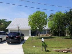 Pre-foreclosure in  SE PERUGIA ST Port Saint Lucie, FL 34952