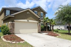 Pre-foreclosure in  MAGNOLIA GROVE WAY Jacksonville, FL 32218