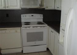 Pre-foreclosure Listing in CHARLEMAGNE BLVD APT 103C NAPLES, FL 34112