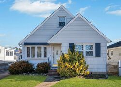 Pre-foreclosure in  COOLIDGE AVE Amityville, NY 11701