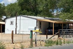 Pre-foreclosure in  YUKON DR Sun Valley, NV 89433