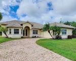 Pre-foreclosure in  NW 38TH PL Cape Coral, FL 33993