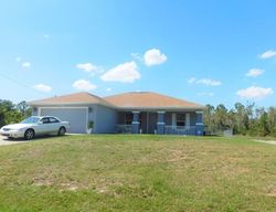 Pre-foreclosure in  HEDGEWOOD ST Lehigh Acres, FL 33974