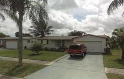 Pre-foreclosure in  NW 3RD ST Pompano Beach, FL 33063