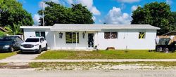 Pre-foreclosure in  NE 213TH TER Miami, FL 33179