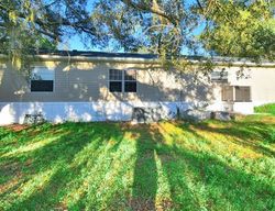 Pre-foreclosure Listing in POYNER OAKS RD N POLK CITY, FL 33868