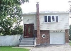 Pre-foreclosure in  MANHATTAN AVE Roosevelt, NY 11575