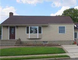 Pre-foreclosure in  PENNSYLVANIA AVE Massapequa Park, NY 11762