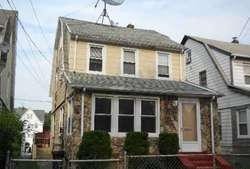 Pre-foreclosure in  210TH ST Queens Village, NY 11429