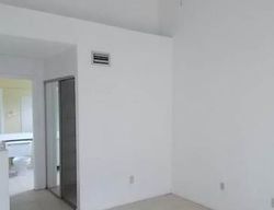 Pre-foreclosure in  PALM BAY CIR APT C West Palm Beach, FL 33406