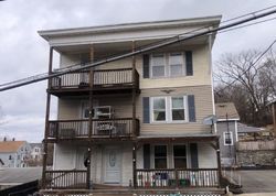Pre-foreclosure in  PINE ST Woonsocket, RI 02895