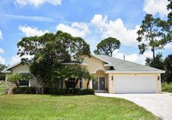 Pre-foreclosure in  SW CARLILE ST Port Saint Lucie, FL 34953